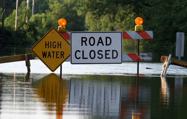 a road covered in flood water